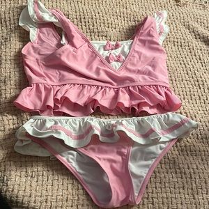 Slightly used little for big bathing suit